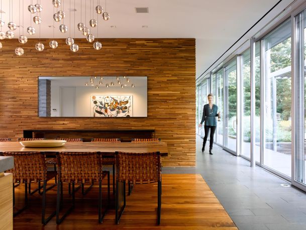 Woman walking in a beautiful dinning room